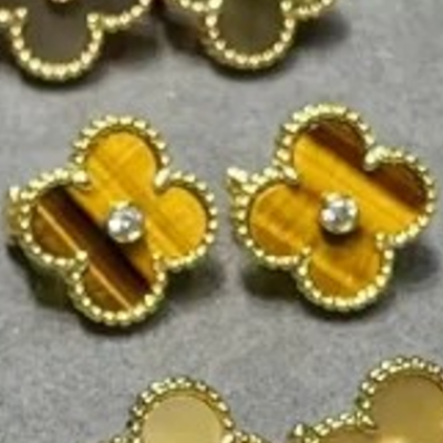 Yellow gold tiger eye with diamond